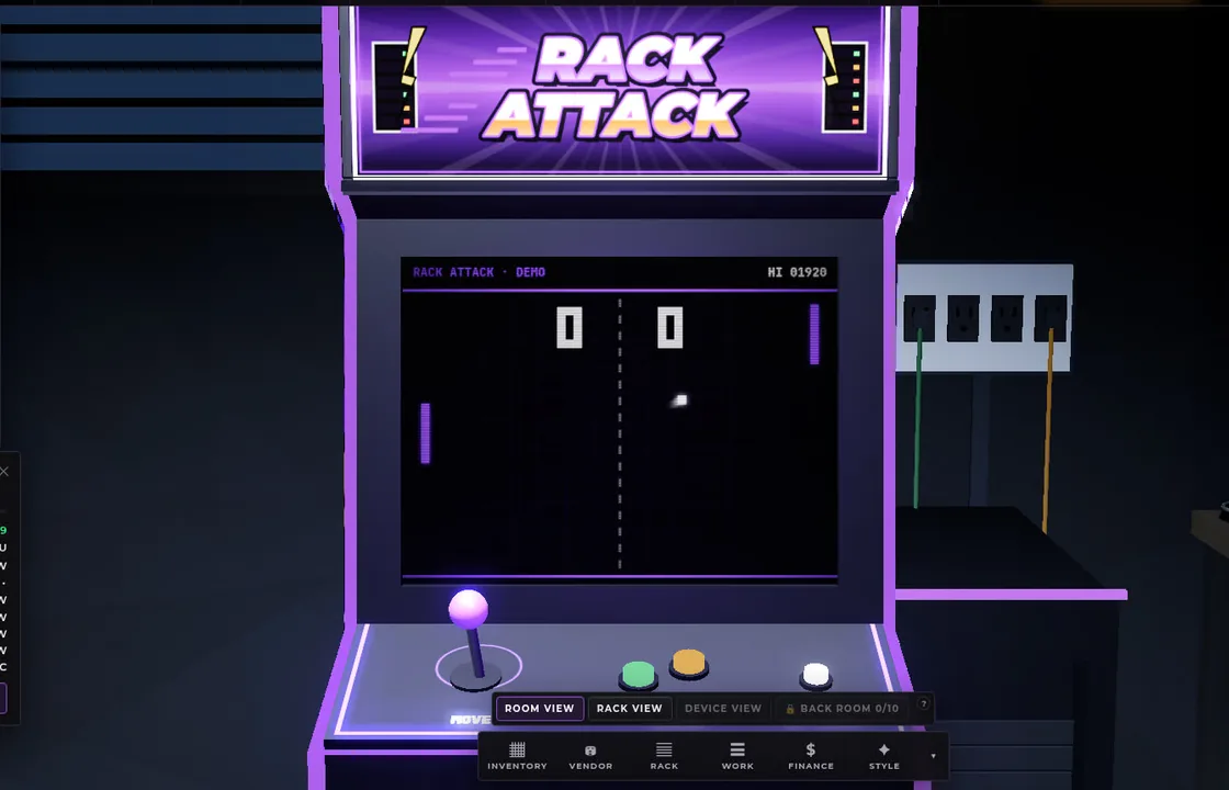 The RACK ATTACK arcade cabinet in Silicon Pirates Beta 3 with a lit marquee and a game of Packet Ping on its screen